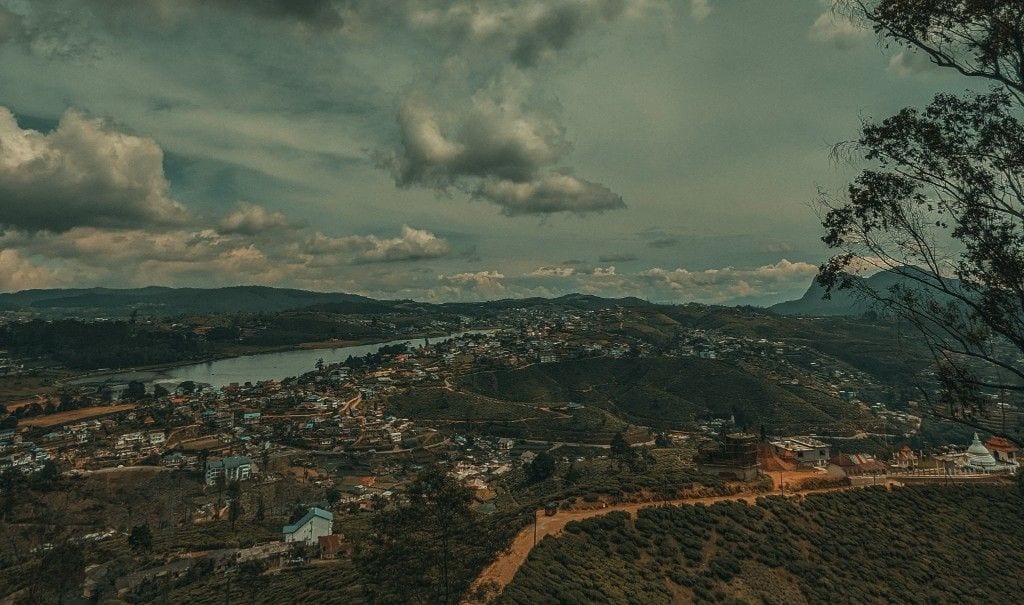Nuwara Eliya hill town, Lake Gregory, and tea estates under dramatic skies, Sri Lanka